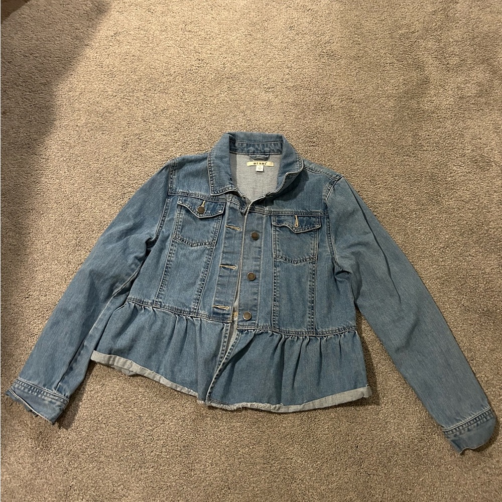 Cute jean jacket by MIAMI in a size M with a cute wavy bottom